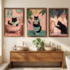 Affiches chat noir accrochees au-dessus d un lavabo