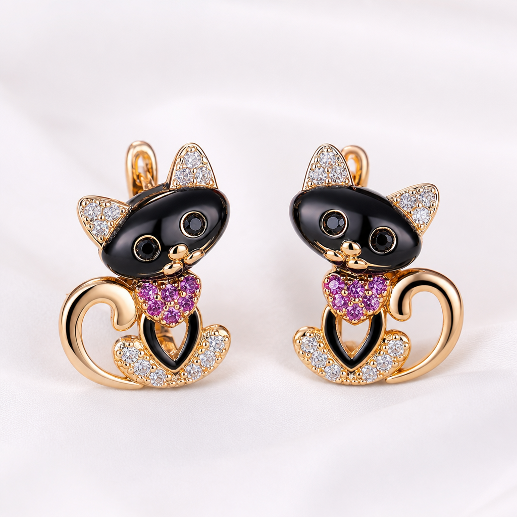 Boucles d oreilles chat noir a pierres, paire, fond blanc