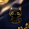 Broche chat noir sur tissu bleu nuit