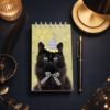 Carnet chat noir illustre sur bureau bleu nuit