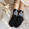 Chaussettes chat noir a pompon portees