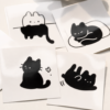 Gros plan sur les stickers chat noir