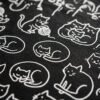 Gros plan sur les motifs chats du tote bag